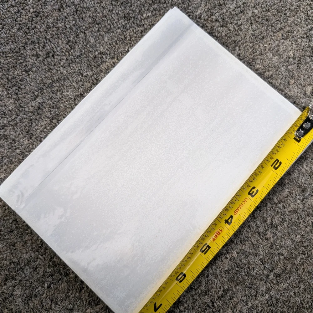Stack of 20 sticking clear label pockets‎ for shipping labels